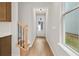 Light and bright entryway features hardwood floors and staircase at 711 Smokey Quartz Way, Kennesaw, GA 30144