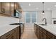 Well-equipped kitchen featuring modern appliances, sleek countertops, and ample cabinet space for storage at 711 Smokey Quartz Way, Kennesaw, GA 30144