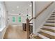 Spacious living area with hardwood floors, view to kitchen and lots of natural light at 711 Smokey Quartz Way, Kennesaw, GA 30144