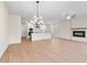 Bright living room with hardwood floors and a fireplace at 711 Smokey Quartz Way, Kennesaw, GA 30144