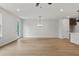 Expansive living room with an open floor plan, perfect for entertaining and enjoying natural light at 711 Smokey Quartz Way, Kennesaw, GA 30144