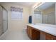 Bathroom with a shower/tub combo and vanity at 982 Trestle Dr, Austell, GA 30106