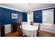 Elegant dining room with hardwood floors and a chandelier at 982 Trestle Dr, Austell, GA 30106