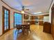 Eat-in kitchen with granite countertops and wood cabinets at 215 Heirloom Ct, Alpharetta, GA 30022