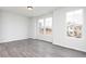 Living area featuring hardwood floors and multiple windows at 1419 Creekside Nw Cir, Atlanta, GA 30318