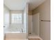 Bathroom with shower and bathtub at 3354 Garden Mill Ln, Ellenwood, GA 30294