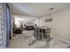 Dining area with carpet flooring, view to living room and Christmas tree at 4225 Parkridge Dr, Powder Springs, GA 30127