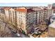 Aerial view of a modern apartment building with red tile roofs at 230 E Ponce De Leon Ave # 317, Decatur, GA 30030