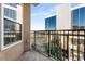 Private balcony with city views and metal railing at 230 E Ponce De Leon Ave # 317, Decatur, GA 30030
