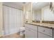 Full bathroom with shower/tub combo and granite vanity at 230 E Ponce De Leon Ave # 317, Decatur, GA 30030