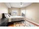 Bright bedroom with hardwood floors, large windows and ceiling fan at 230 E Ponce De Leon Ave # 317, Decatur, GA 30030