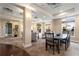 Community dining area with table and chairs near windows at 230 E Ponce De Leon Ave # 317, Decatur, GA 30030