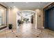 Elegant lobby with tiled floors, seating area, and elevator access at 230 E Ponce De Leon Ave # 317, Decatur, GA 30030