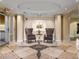 Welcoming lobby with seating area and decorative tile floor at 230 E Ponce De Leon Ave # 317, Decatur, GA 30030