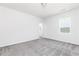 Bright bedroom with gray carpeting and neutral walls at 1362 Creekside Nw Cir, Atlanta, GA 30318