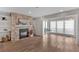 Open living space featuring a stone fireplace and hardwood floors at 2642 Vinings Central Se Dr # 3, Atlanta, GA 30339