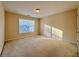 Spacious bedroom with large window and neutral carpeting at 3065 Moser Way, Marietta, GA 30060