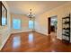 Formal dining room with hardwood floors, wainscoting, and a chandelier at 3065 Moser Way, Marietta, GA 30060