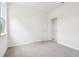 Bedroom features neutral carpet and closet at 7289 Eton Ln, Locust Grove, GA 30248