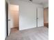 A standard sized bedroom features neutral carpeting and a closet at 7289 Eton Ln, Locust Grove, GA 30248