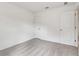 An empty bedroom features neutral carpeting, white walls, and standard-sized closet at 7289 Eton Ln, Locust Grove, GA 30248