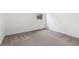 Bedroom featuring neutral carpet and a window at 7289 Eton Ln, Locust Grove, GA 30248