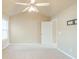 Well-lit bedroom with ceiling fan and ample space at 3928 Princeton Lakes Sw Way, Atlanta, GA 30331