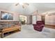 Living room with hardwood floors and view of dining area at 3454 Hill Ln, Acworth, GA 30102