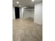 Open-concept living space with tile flooring and recessed lighting at 20 Marietta Nw St # 6F, Atlanta, GA 30303