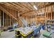 Partially finished basement area, framed with exposed beams, with potential for custom remodeling and lots of storage at 9475 Dunmoore Dr, Cumming, GA 30028