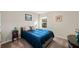 Bedroom with carpeted floors, natural light and neutral paint at 9475 Dunmoore Dr, Cumming, GA 30028