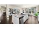Spacious kitchen with granite countertops, stainless steel appliances, and open layout to the living areas at 9475 Dunmoore Dr, Cumming, GA 30028