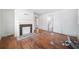 Hardwood floors, fireplace, and open view to kitchen at 266 Whitaker Nw Cir, Atlanta, GA 30314