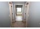Hallway leading to a bathroom with a large soaking tub at 3854 Heritage Crest Pkwy, Buford, GA 30519
