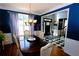 Elegant dining room with hardwood floors, chandelier, and view of entryway at 3854 Heritage Crest Pkwy, Buford, GA 30519