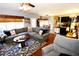 Spacious living room with hardwood floors, sectional sofa, and open floor plan at 3854 Heritage Crest Pkwy, Buford, GA 30519