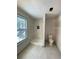 This updated bathroom features a walk-in shower with modern tiles and a new shower head fixture at 5619 Mayfair Crossing Dr, Lithonia, GA 30038
