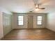 Large bedroom with durable flooring and good natural light has a walk-in closet for storage at 5619 Mayfair Crossing Dr, Lithonia, GA 30038