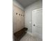 Inviting entryway with built-in bench and coat hooks at 1534 Stargrass Dr, Grayson, GA 30017
