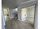 Bright foyer with hardwood floors and elegant staircase at 1534 Stargrass Dr, Grayson, GA 30017