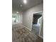 Upstairs hallway with carpeted floors and access to bedrooms at 1534 Stargrass Dr, Grayson, GA 30017