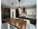 Spacious kitchen featuring a large island, stainless steel appliances, and modern cabinetry at 1534 Stargrass Dr, Grayson, GA 30017