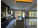Modern kitchen with island, stainless steel appliances, and large windows at 1534 Stargrass Dr, Grayson, GA 30017