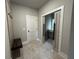 Convenient laundry room with built-in bench and sliding doors at 1534 Stargrass Dr, Grayson, GA 30017