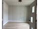 Bright home office with vertical shiplap wall and light hardwood floors at 1534 Stargrass Dr, Grayson, GA 30017