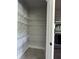 Walk-in pantry with wire shelving; great for storage at 1534 Stargrass Dr, Grayson, GA 30017