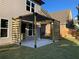 Covered patio with wooden privacy screens and shade at 1534 Stargrass Dr, Grayson, GA 30017