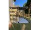 Covered patio with wooden privacy screens and shade at 1534 Stargrass Dr, Grayson, GA 30017