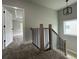 Modern staircase with wood and metal accents at 1534 Stargrass Dr, Grayson, GA 30017
