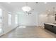 Bright dining room with hardwood floors and ceiling fan at 548 Sawnee Village Blvd # D72, Cumming, GA 30040